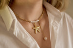 Starfish Status ketting van roestvrij staal met zeesterbedel en parels, beachy, charmant en verfijnd, waterproof en duurzaam.