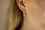 Aura oorbellen van 925 sterling silver, handgemaakt uit Denemarken. Subtiel en elegant ontwerp, ideaal voor minimalistische of gelaagde sieradenstijlen.