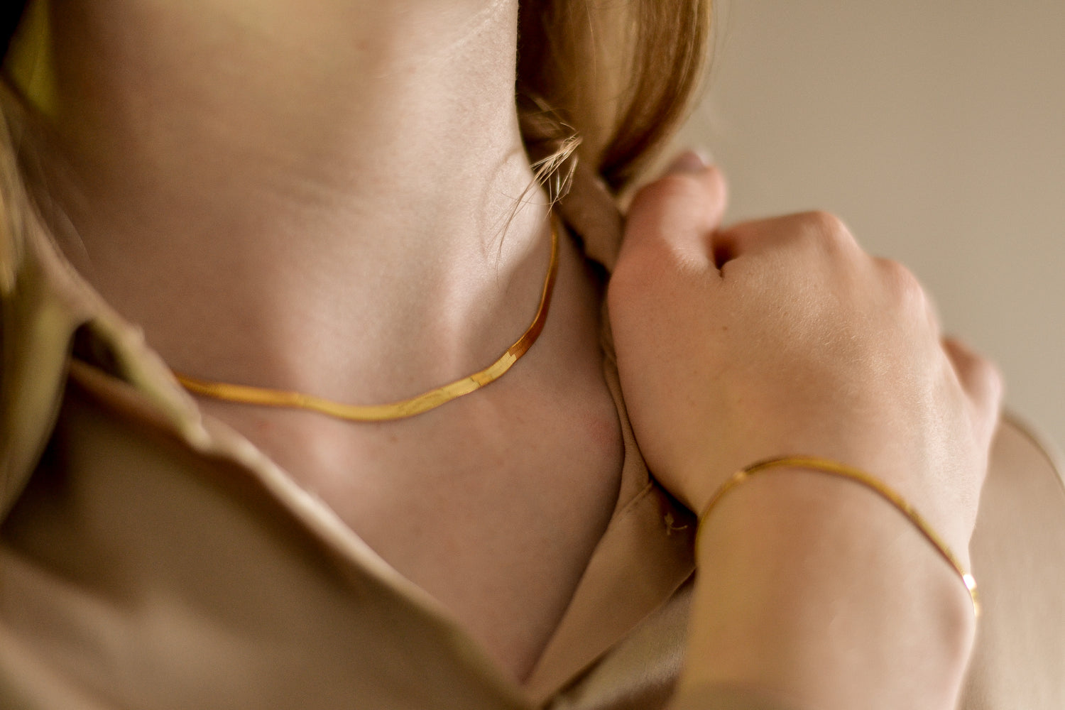 Slange ketting van 925 sterling zilver met 18K gold plating, platte schakel.
