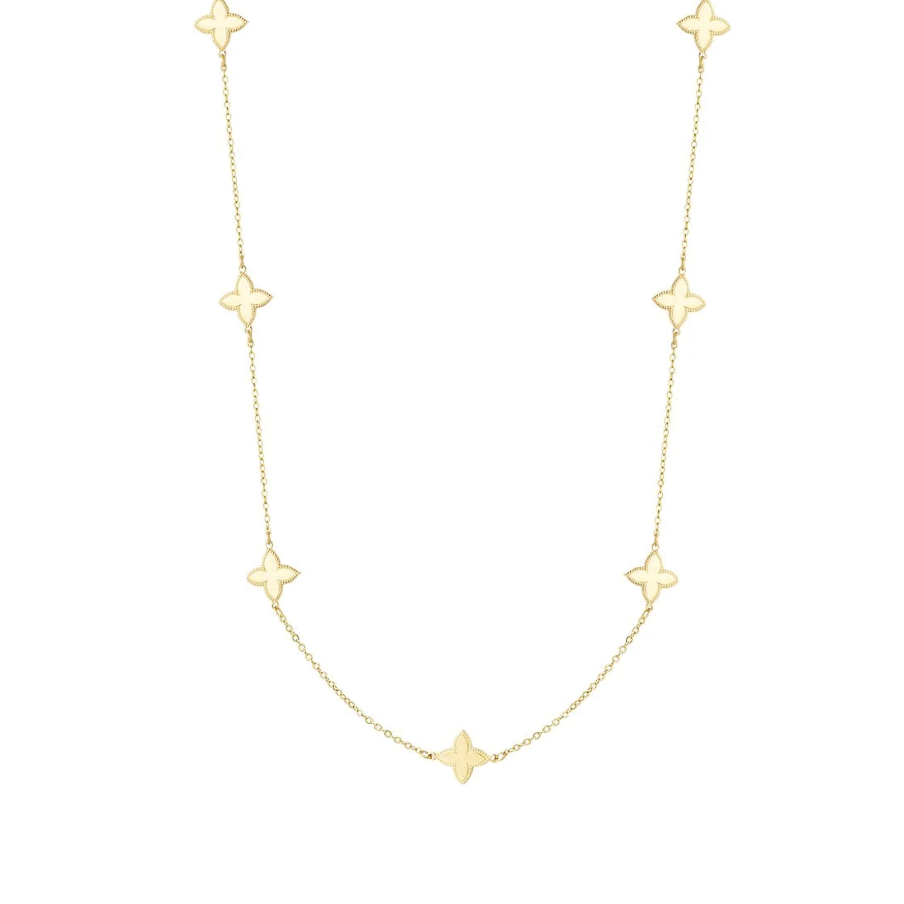 Verfijnde zilveren ketting met kleine klaverbedels.